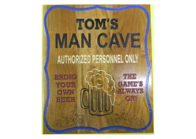 toms man cave sign